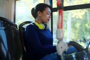 Woman Commuting On Bus